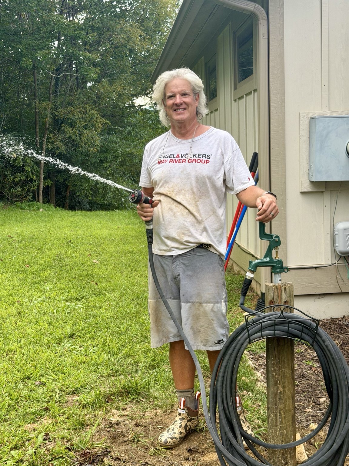 Barry watering the grounds at Bridlewood