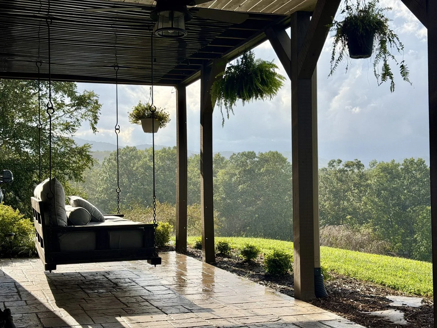 Covered porch looking out over the Bridlewood landscape